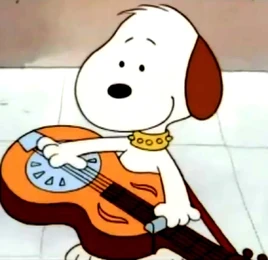 Rover with his steel guitar in Snoopy’s Reunion